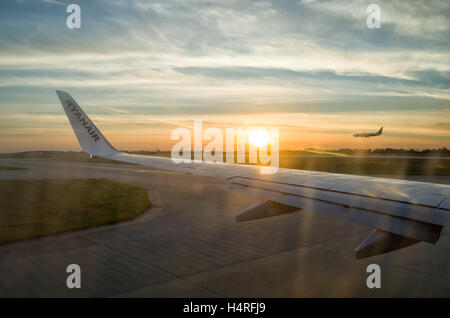 London Stansted Airport. England UK. View from Boeing 737-800 about to take off from London Stansted as another aeroplane is about to land in the distance. Stock Photo