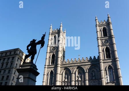 Maisonneuve Monument and Notre Dame Basilica on Place d'Armes, Old Montreal Quebec, Canada Stock Photo