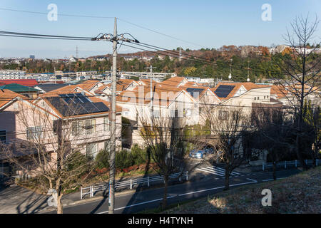 Solar Power Panels on the roof top of houses, Tama City, Tokyo, Japan Stock Photo