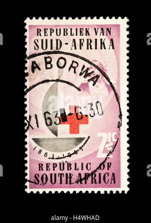 Postage stamp from South Africa depicting the century emblem and nurse, centennial of the International Red Cross Stock Photo