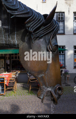 Horse head drinking fountain, Bruges Stock Photo