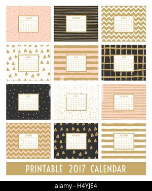 Twelve month 2017 calendar template. Hand drawn patterns in black, gold, pastel pink and cream. Stock Vector