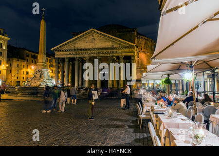 Night view of an outdoor bar restaurant at Piazza della Rotonda square with Pantheon in the background, Rome, Lazio, Italy Stock Photo