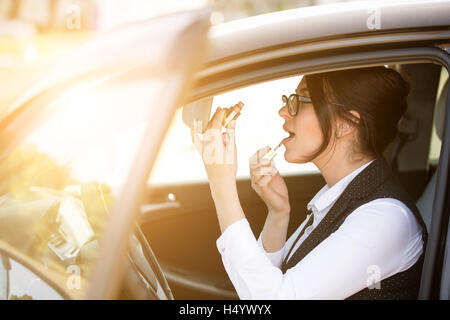 happy young woman in the car Stock Photo