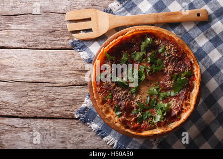 Chicago deep dish pizza on the table. horizontal view from above Stock Photo