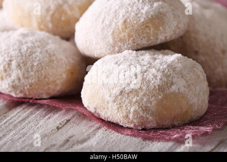 polvoron cookies with powdered sugar macro on a wooden table. horizontal Stock Photo