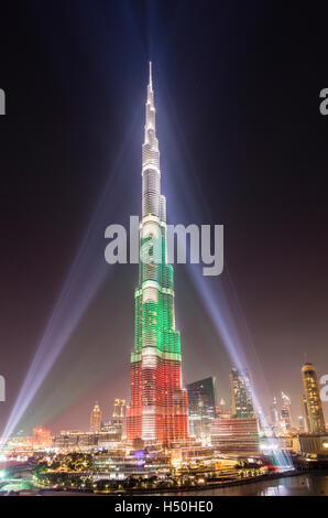 Evening view of Burj Khalifa skyscraper illuminated with national flag colours in Dubai United Arab Emirates Stock Photo