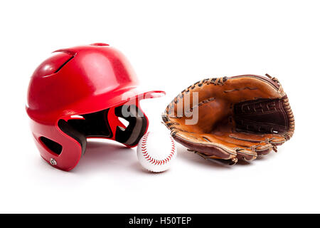 Baseball equipment consisting of red helmet, leather glove and baseball. Isolated on white background. Stock Photo