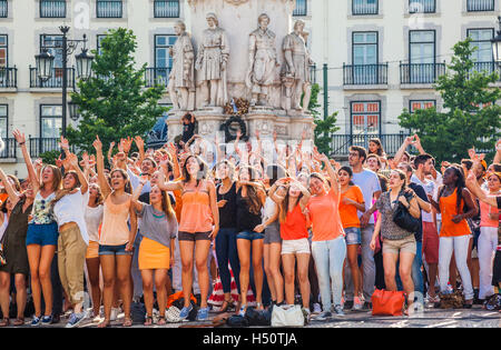 cheering crowd on Largo de Camoes, in the Lisbon neighborhood of Chiado, Lisbon, Portugal Stock Photo