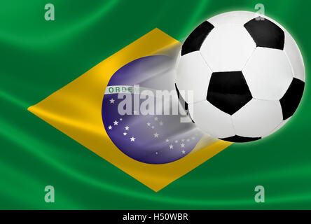 Soccer ball flying out of the Brazilian flag in anticipation of 2014 World Cup Stock Photo