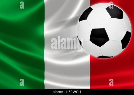 Ball leaps out of the flag of Italy, where soccer is a national passion. Stock Photo