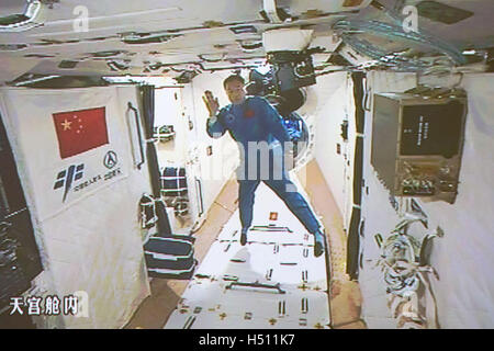 Beijing, China. 19th Oct, 2016. Photo taken on Oct. 19, 2016 shows the screen at the Beijing Aerospace Control Center showing Chinese astronaut Jing Haipeng entering the space lab Tiangong-2. The two astronauts onboard the Shenzhou-11 spacecraft entered the space lab Tiangong-2 Wednesday morning. © Ju Zhenhua/Xinhua/Alamy Live News Stock Photo