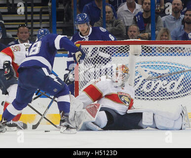 Tampa, Florida, USA. 18th Oct, 2016. DIRK SHADD | Times.Tampa Bay Lightning left wing Ondrej Palat (18) beats Florida Panthers goalie James Reimer (34) as the Bolts go ahead 2 to 1 during second period action at Amalie Arena in Tampa Tuesday evening (10/18/16) Credit:  Dirk Shadd/Tampa Bay Times/ZUMA Wire/Alamy Live News Stock Photo