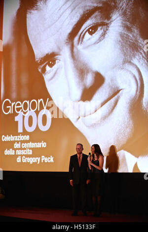 Rome. 18th Oct, 2016. Late U.S. actor Gregory Peck's son Anthony Peck (L) and daughter Cecilia Peck Voll speak before the screening of the film Rome Holiday at Spanish Square on Oct. 18, 2016 in Rome, Italy. The well-known movie Rome Holiday was screened on Tuesday at Spanish Square of Rome to celebrate the centenary of the birth of Gregory Peck. © Jin Yu/Xinhua/Alamy Live News Stock Photo
