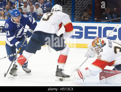 Tampa, Florida, USA. 18th Oct, 2016. DIRK SHADD | Times.Tampa Bay Lightning center Brayden Point (21) battles to get the puck on net against Florida Panthers defenseman Keith Yandle (3) and Florida Panthers goalie James Reimer (34) during first period action at Amalie Arena in Tampa Tuesday evening (10/18/16) Credit:  Dirk Shadd/Tampa Bay Times/ZUMA Wire/Alamy Live News Stock Photo