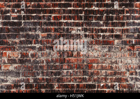 Brick wall seamless photo, weathered stained old texture background Stock Photo