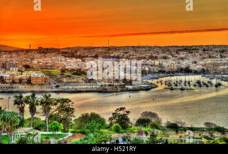 Sunset over Msida town in Malta Stock Photo