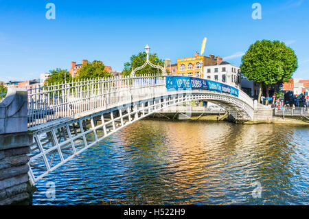 Ha'penny or Halfpenny Bridge over River Liffey Dublin Ireland Europe EU Stock Photo
