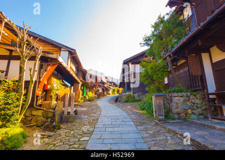 Beautifully restored wooden houses on the Nakasendo trail in the ancient post town of Magome, Kiso Valley, Japan. Horizontal Stock Photo