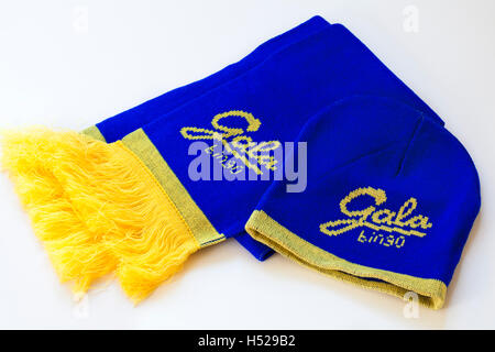 Bingo prize - Gala Bingo blue and yellow scarf and hat set on white background Stock Photo