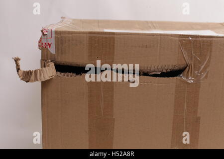 Fragile box damaged isolated on white Stock Photo