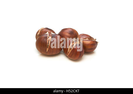 Roasted sweet chestnuts isolated on white background Stock Photo
