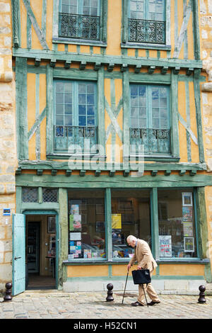 Old man and fifteenth century building Grande Rue old Plantagenet city Le Mans France Stock Photo
