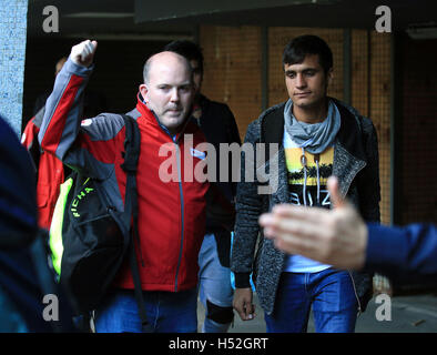 RETRANMISSION REMOVING PIXELATION A teenager who has arrived from the &quot;Jungle&quot; camp in Calais leaves Lunar House in Croydon, south London. Stock Photo