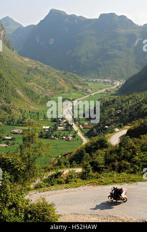 Motorbike on a road between Ha Giang and Dong Van, North Vietnam Stock Photo