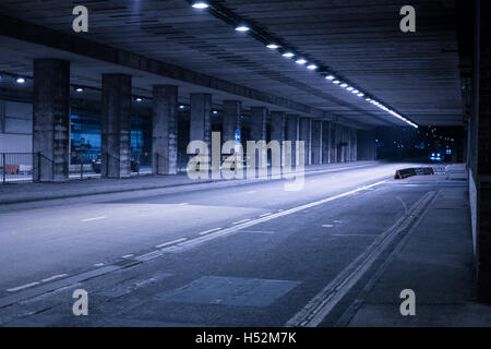 Covered Street Illuminated at Night Stock Photo