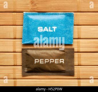 Salt and Pepper catering sachets. Stock Photo