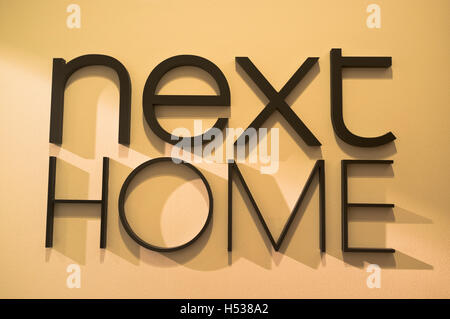 dh Next Home SHOP UK Next home store sign Stock Photo