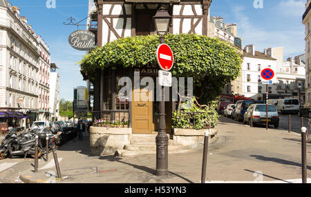 Paris, France-July 09, 2016: The traditionnal French restaurant Le Basilic located in picturesque Montmartre district of Paris. Stock Photo