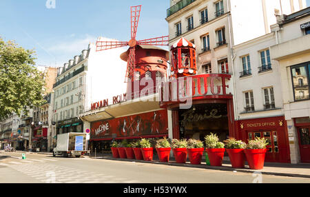 Paris, France-July 09, 2016: The famous cabaret Moulin Rouge located in picturesque Montmartre district of Paris. Stock Photo