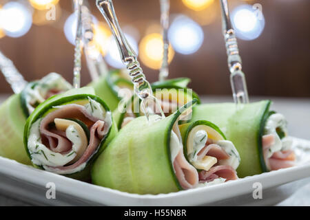 Cucumber rolls with ham and cheese Stock Photo