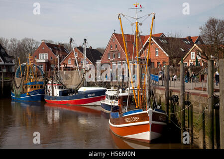 Fishing boats in the harbour, Neuharlingersiel, East Frisia, Lower Saxony Stock Photo