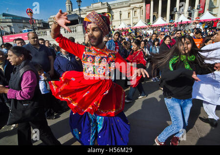 Diwali festival,Trafalgar Square, man in traditional indian dress dancing Stock Photo