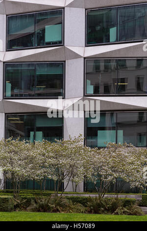 London, United Kingdom - April 2016: Cropped street view of a commecial office building. Frontal facade Stock Photo