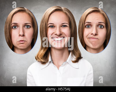 Young girl changes her face portraits. Stock Photo