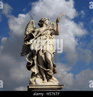 Beautiful angel statue holding a lance with heavenly sky, from Sant'Angelo Bridge in the historic center of Rome (17th century) Stock Photo