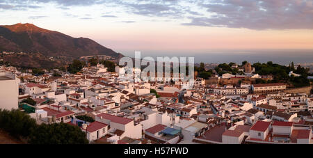 view of the white washed village of Mijas Pueblo, during sunset in Southern Spain, Andalusia. Stock Photo
