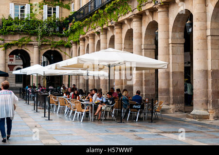 Outdoor cafe seating on Plaza Nueva, or Plaza Barria in Basque language, Bilbao, Spain Stock Photo