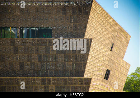 Detail, bronze-colored lattice work and inverted pyramid shape of the National Museum of African American History and Culture. Stock Photo