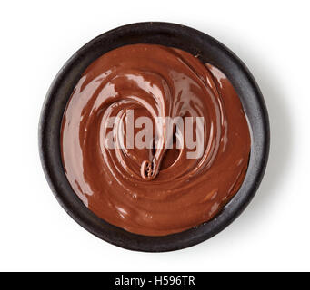Chocolate cream in round dish isolated on white background, top view Stock Photo