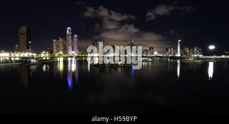 Panama City, Panama- June 08: Twilight Cityscape from across the bay in Panama with a serene reflection on the water. June 08 20 Stock Photo