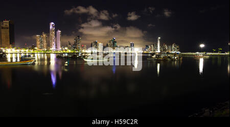 Panama City, Panama- June 08: Twilight Cityscape from across the bay in Panama with a serene reflection on the water. June 08 20 Stock Photo