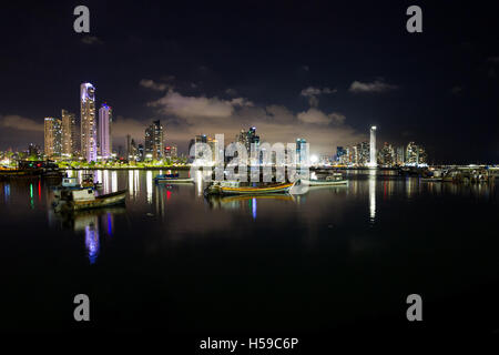 Panama City, Panama- June 08: Twilight Cityscape from across the bay in Panama with a serene reflection on the water. June 08 20 Stock Photo