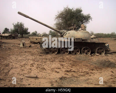 19th April 2003 Abandoned wrecks of Iraqi T54/T55 main battle tanks on a former army base in Diwaniyah, Iraq. Stock Photo