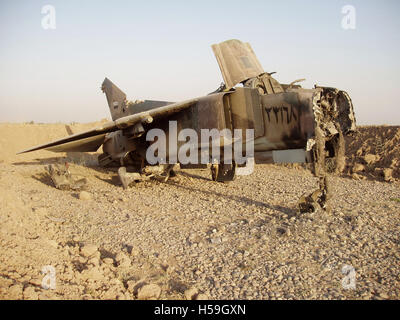 9th July 2003 A destroyed Iraqi, Soviet-made MiG-23 “Flogger” jet fighter near the Balad Air Base, north of Baghdad, Iraq. Stock Photo
