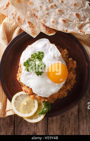 Arabic Breakfast: Ful Medames With A Fried Egg On A Plate Close-up ...